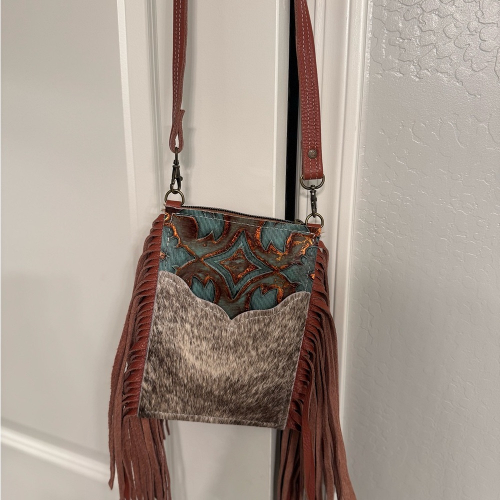 Oklahoma made crossbody.  Stadium size.